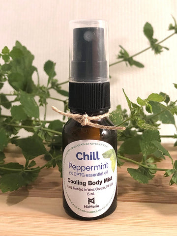 chill peppermint cooling spray in small brown bottle with mist top.